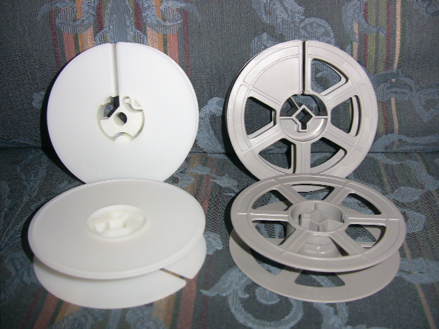 old 1950s 16mm movie film reels w/ mailing cases vintage shipping labels  photo props